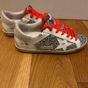 Super-star lace up golden goose sneakers.
